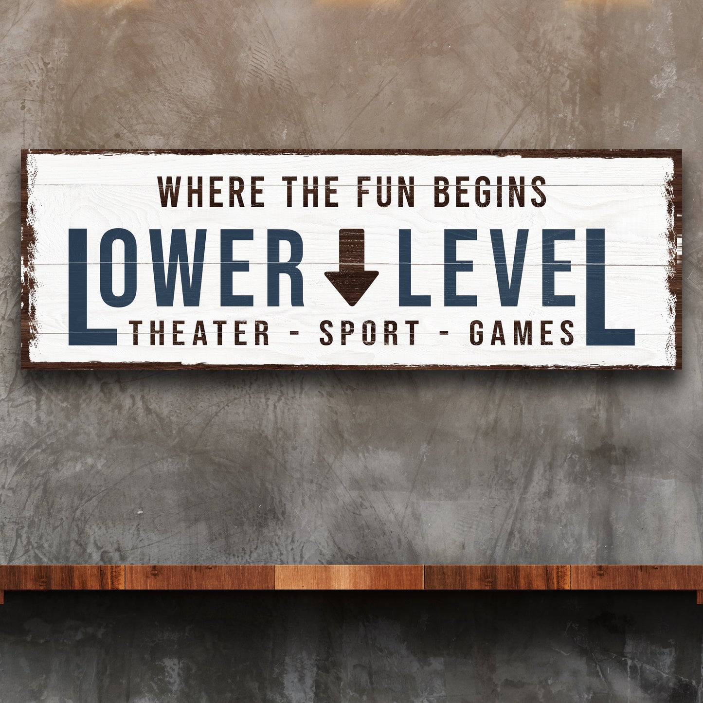 Lower Level sign canvas with distressed white plank backdrop and bold navy home bar lettering on Tampa Home & Garden Store