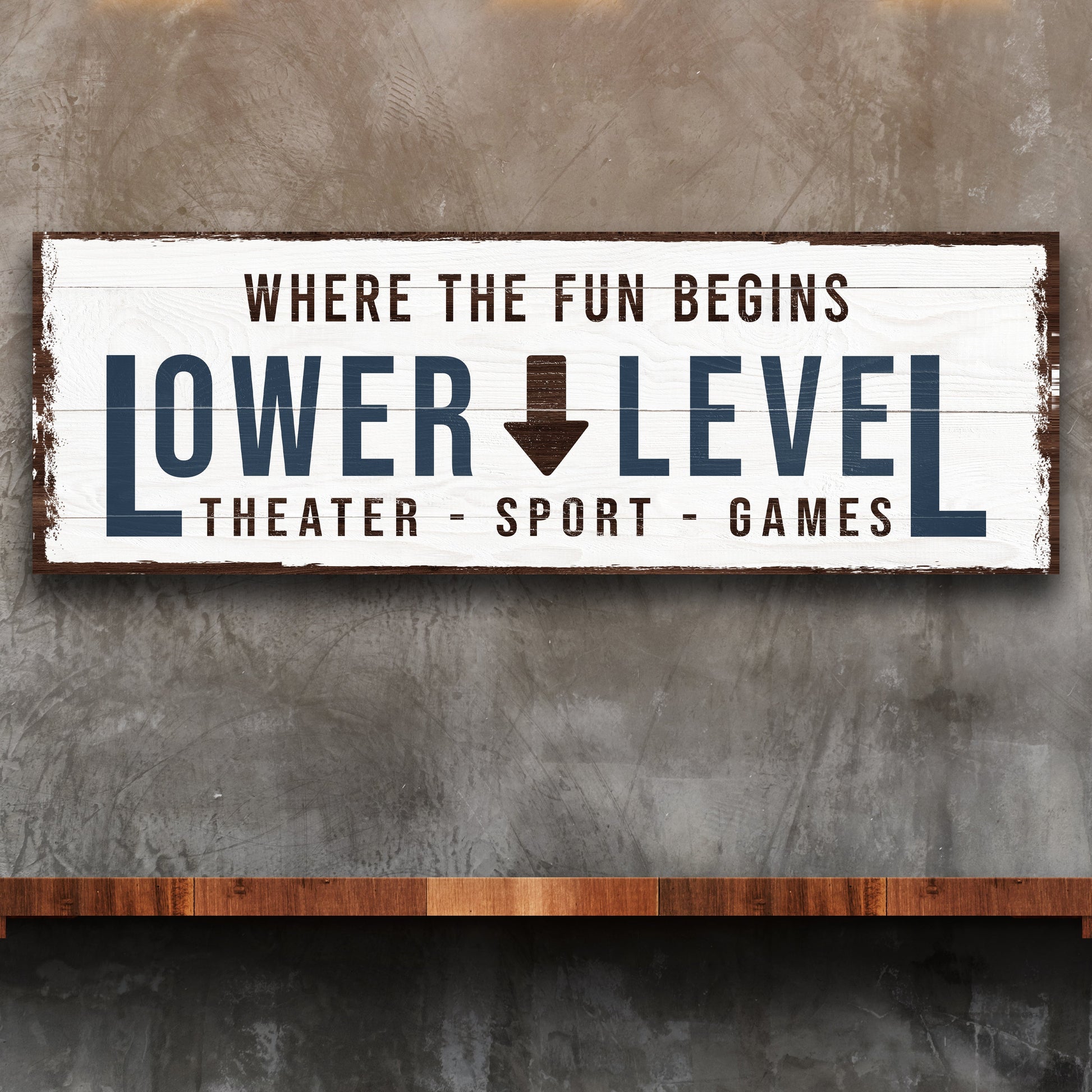Lower Level sign canvas with distressed white plank backdrop and bold navy home bar lettering on Tampa Home & Garden Store