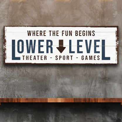 Lower Level sign canvas with distressed white plank backdrop and bold navy home bar lettering on Tampa Home & Garden Store