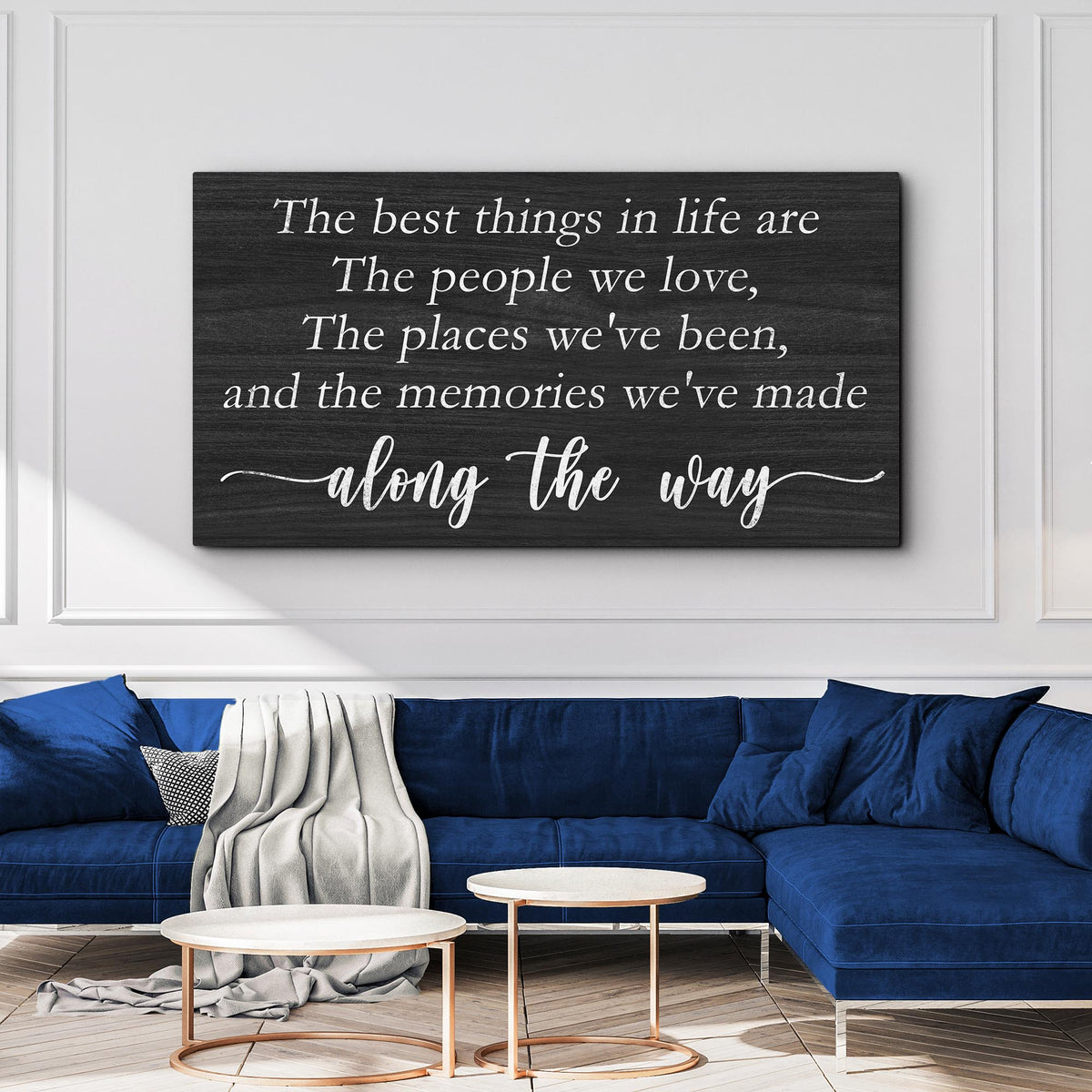 Best Things In Life Sign III canvas wall art, black panel with white script above blue sofa on Tampa Home & Garden Store