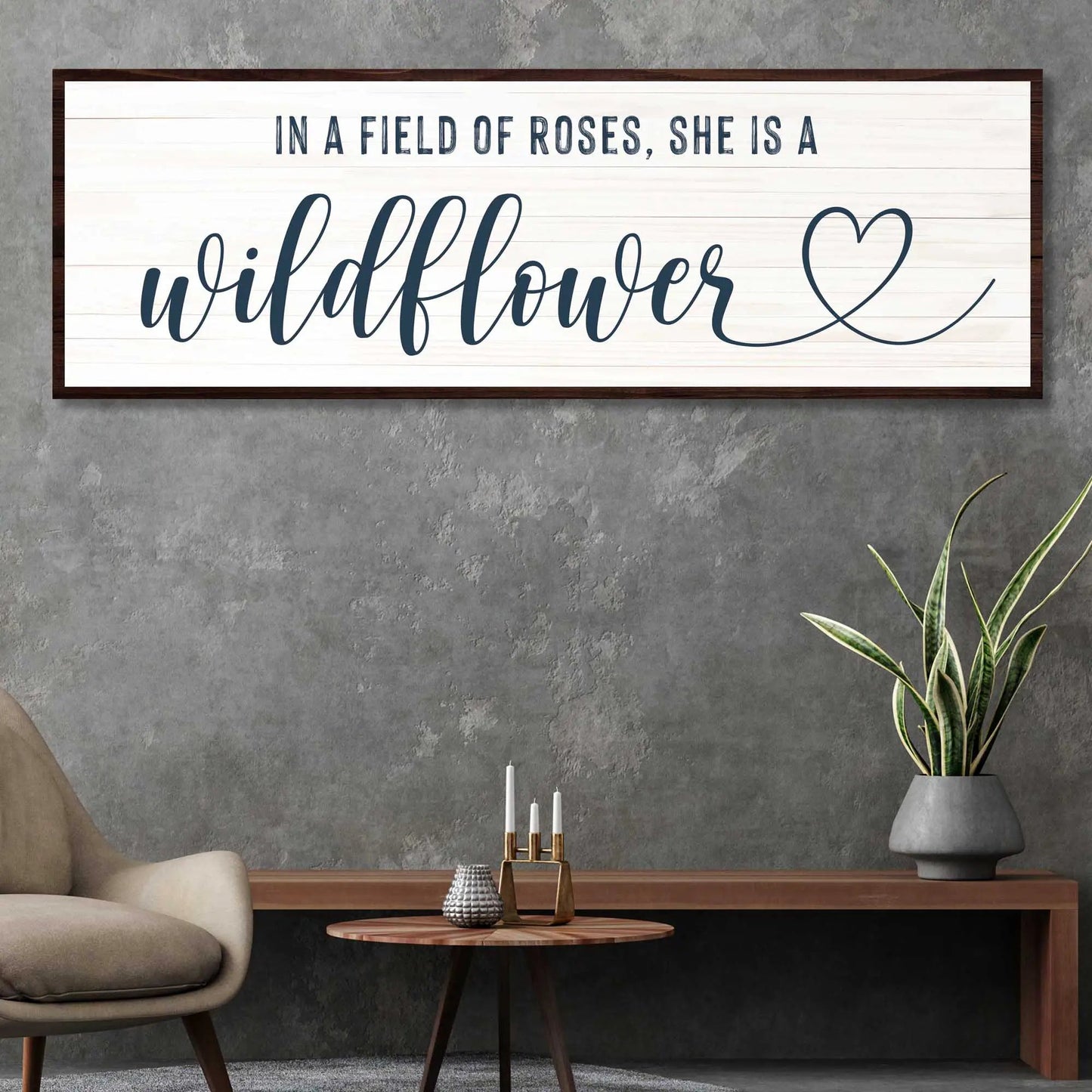 She Is A Wildflower II canvas sign by Tailored Canvases on whitewashed wood panel, dark frame on Tampa Home & Garden Store