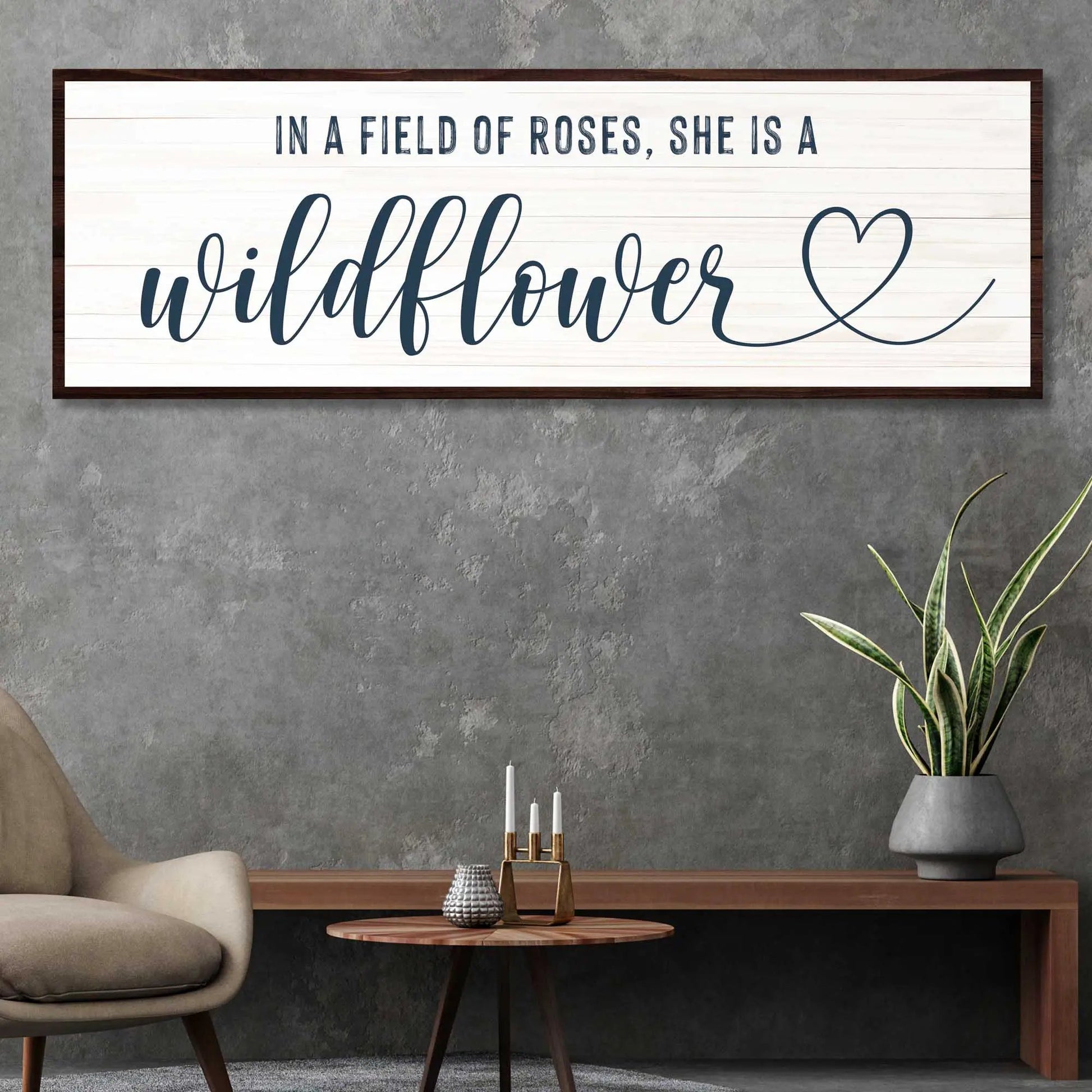She Is A Wildflower II canvas sign by Tailored Canvases on whitewashed wood panel, dark frame on Tampa Home & Garden Store