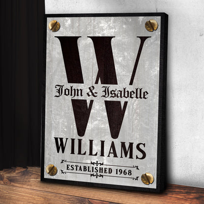 Family Name Portrait Monogram Sign III canvas with black W monogram and gold corner mounts on Tampa Home & Garden Store