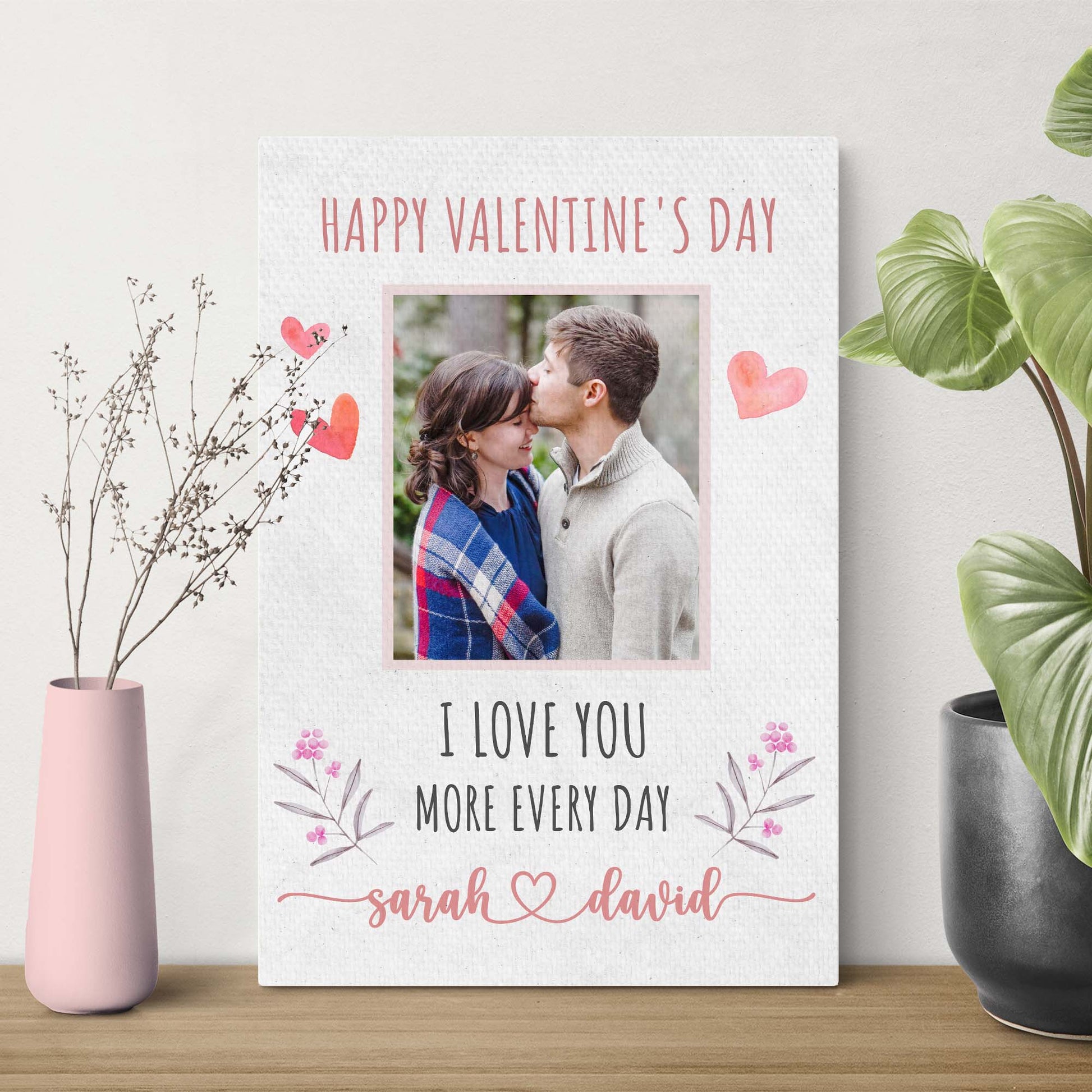 Canvas romantic sign with pink lettering I Love You More Every Day and floral accents on Tampa Home & Garden Store