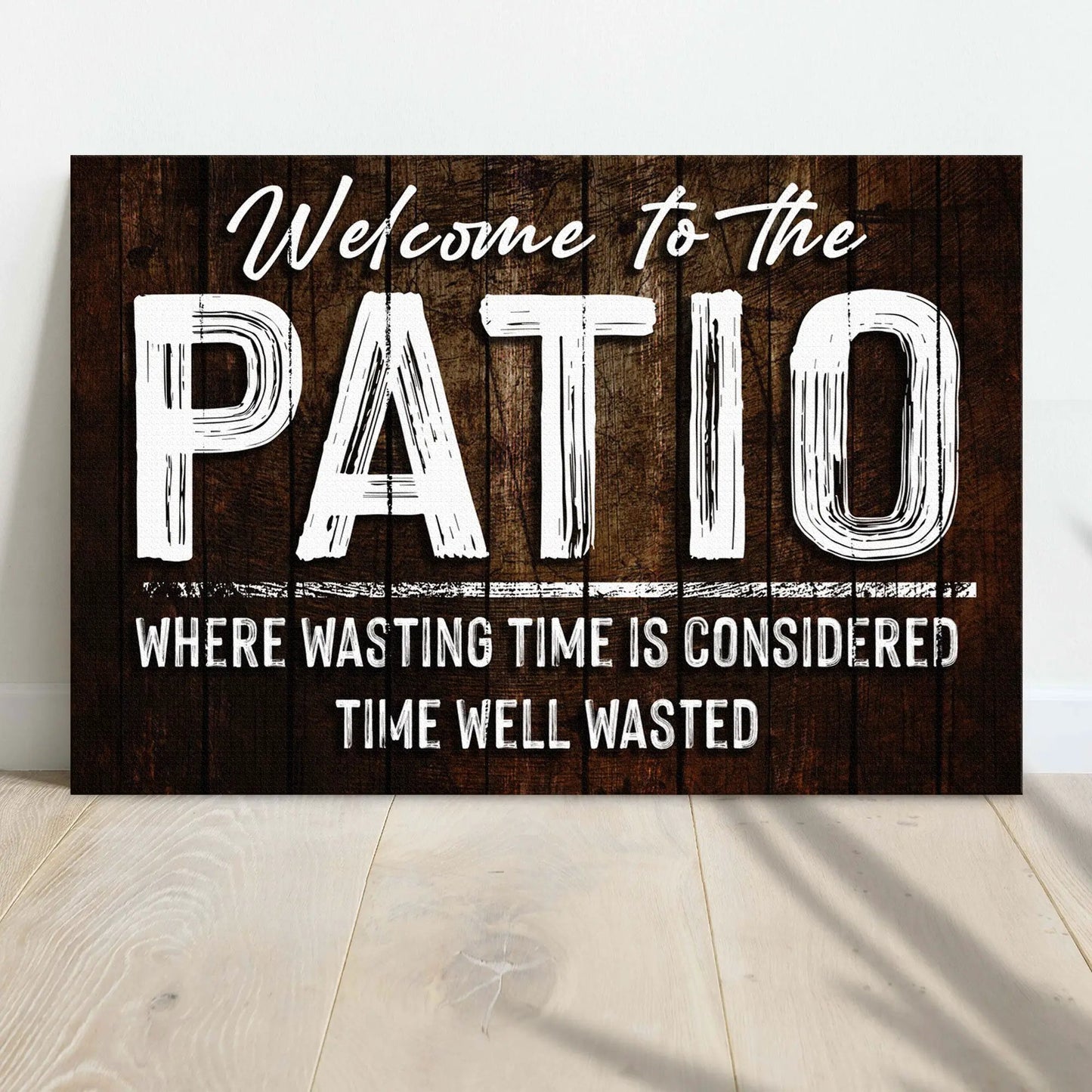 Welcome To The Patio Sign Tailored Canvases rustic wood canvas with white lettering on Tampa Home & Garden Store