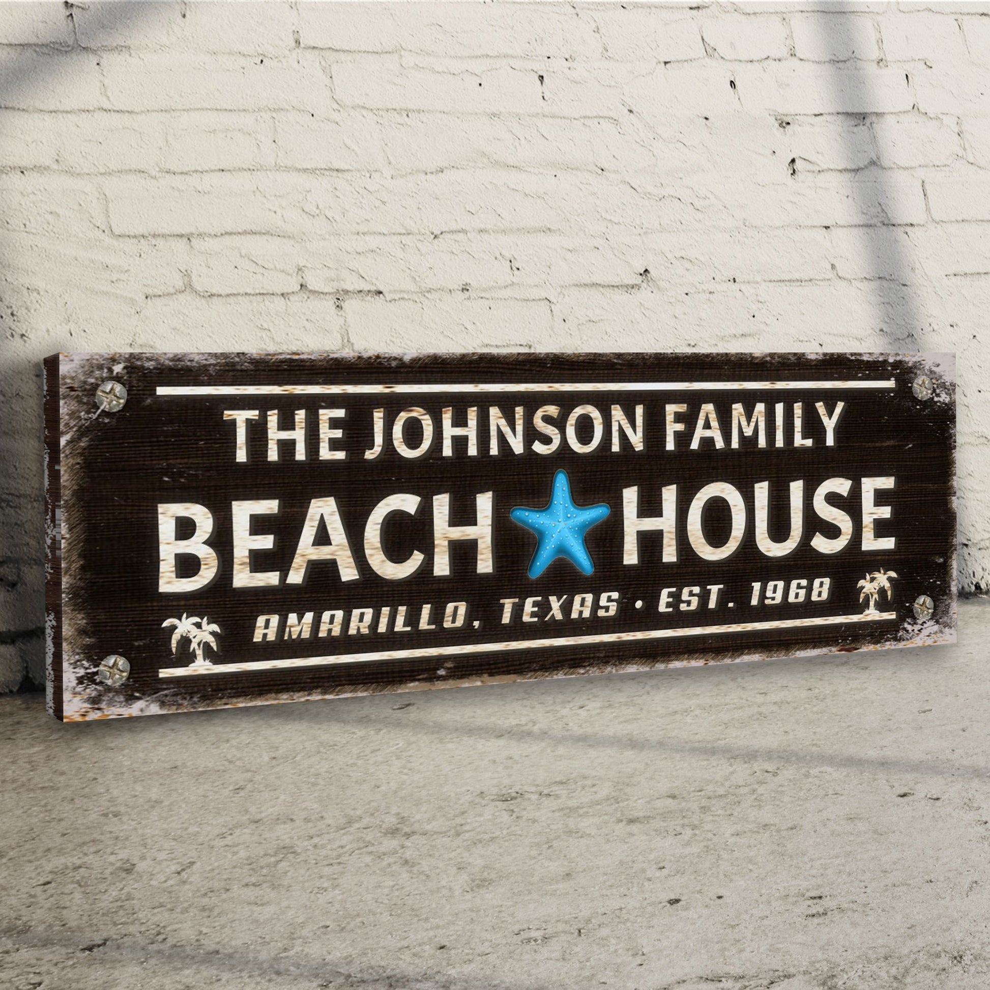 Family Beach House Sign III canvas with distressed wood, white lettering, blue starfish on brick on Tampa Home & Garden Store
