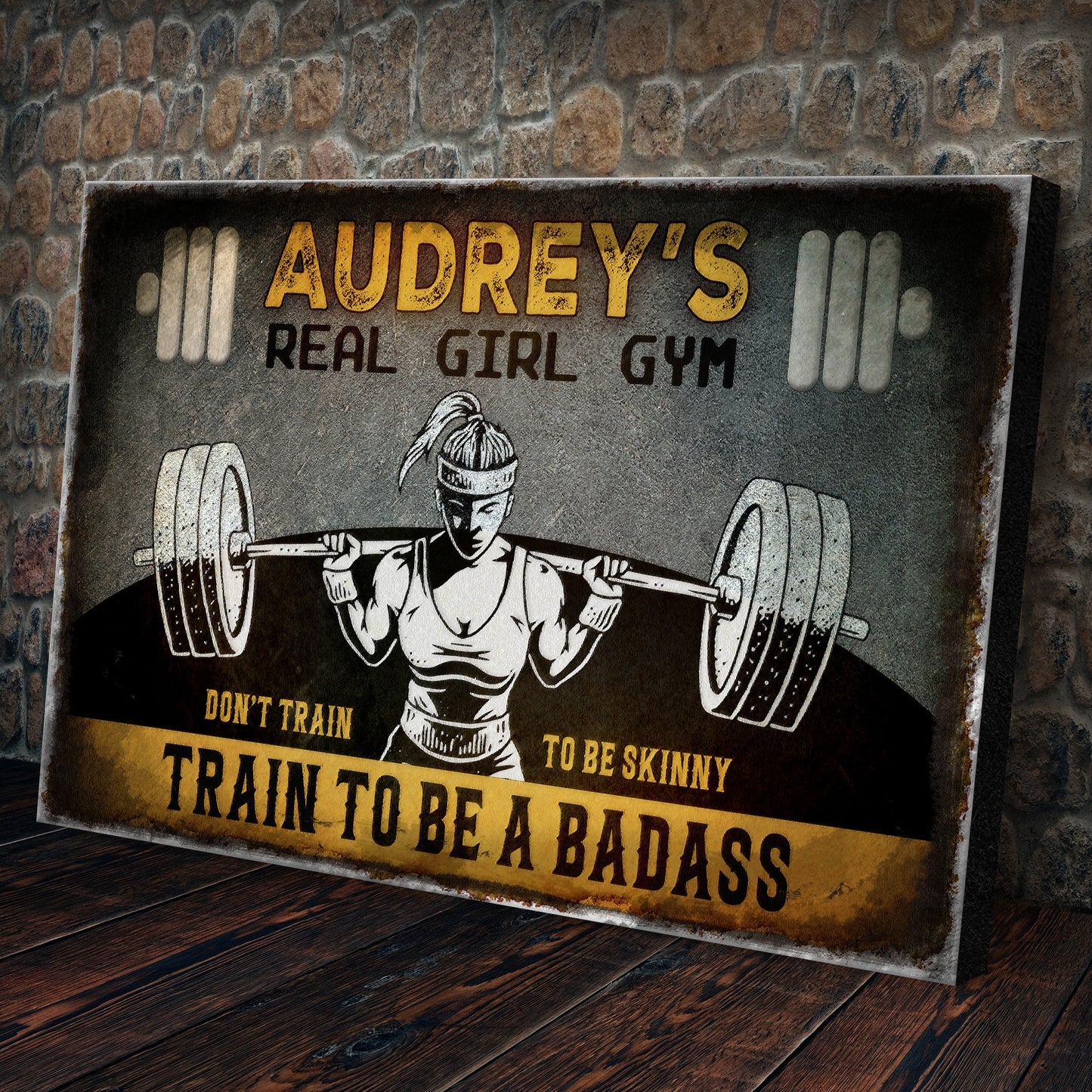 Real Girl Gym canvas sign with vintage yellow lettering on a dark distressed background on Tampa Home & Garden Store