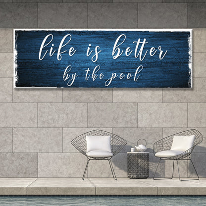 Life Is Better By The Pool Sign canvas on blue wood with white script Tailored Canvases on Tampa Home & Garden Store