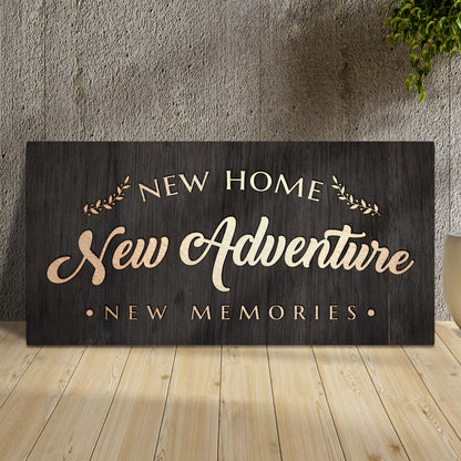 Canvas sign Tailored Canvases New Home New Adventure New Memories script laurel on dark wood on Tampa Home & Garden Store