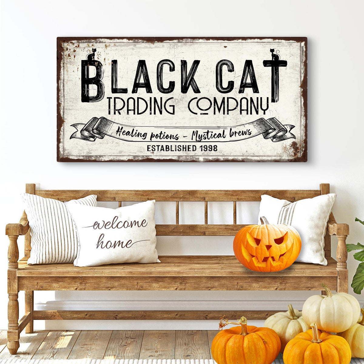 Canvas sign Black Cat Trading Company with distressed texture and bold black Tailored Canvases on Tampa Home & Garden Store