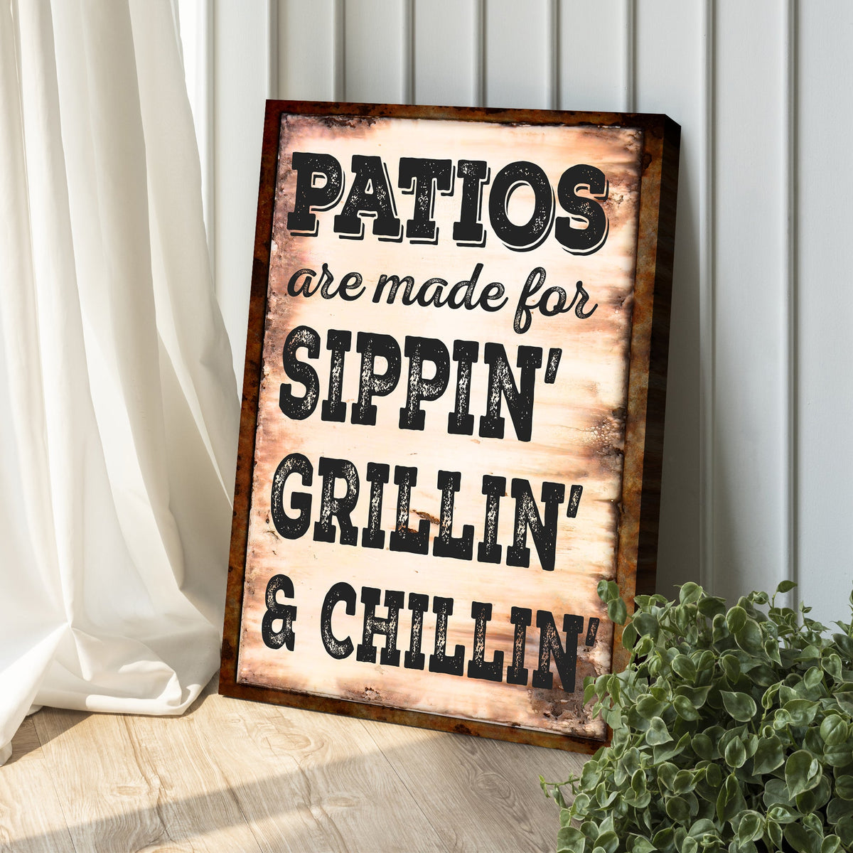 Canvas sign Tailored Canvases reading Patios Are Made For Sippin' Grillin' And Chillin' on Tampa Home & Garden Store