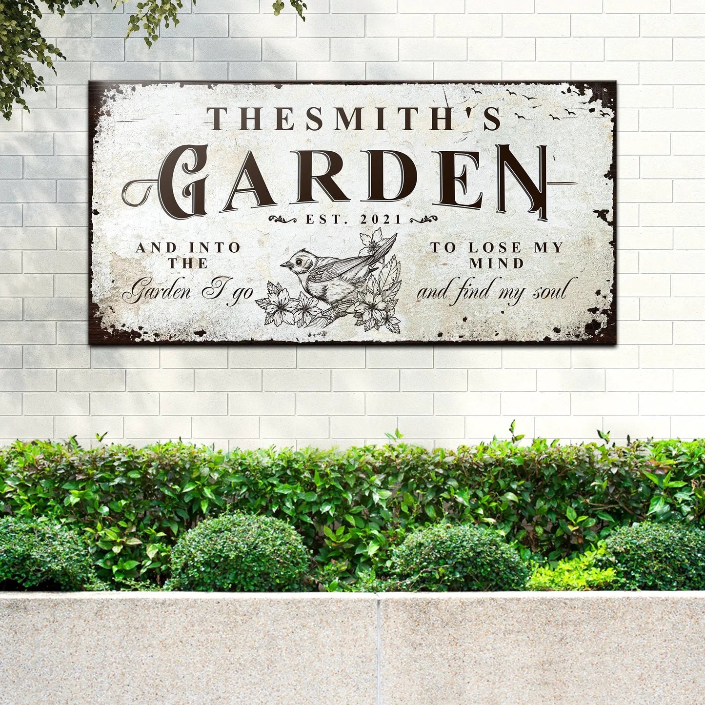 Family Garden Sign canvas with distressed beige plaque and vintage typography on a brick wall on Tampa Home & Garden Store