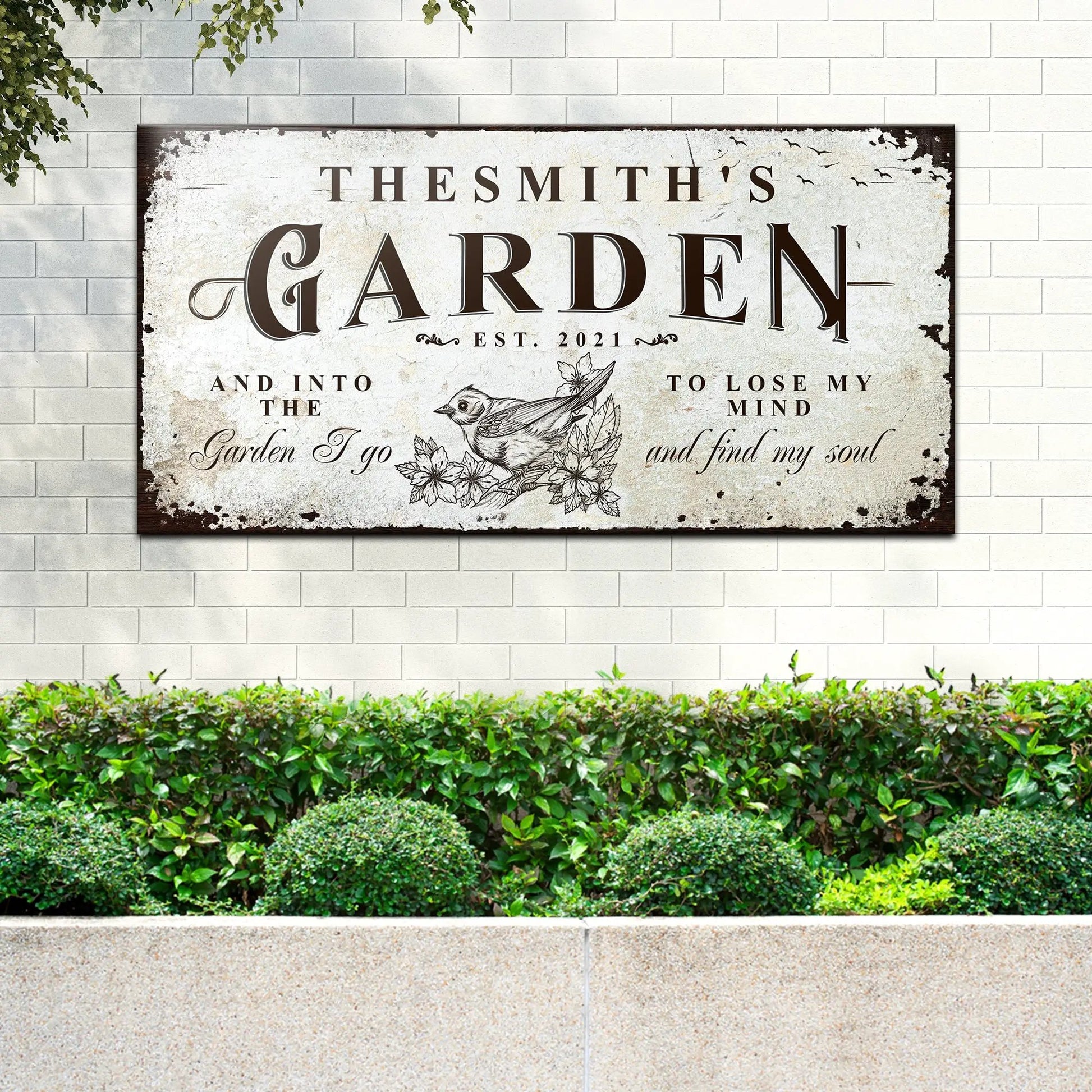 Family Garden Sign canvas with distressed beige plaque and vintage typography on a brick wall on Tampa Home & Garden Store