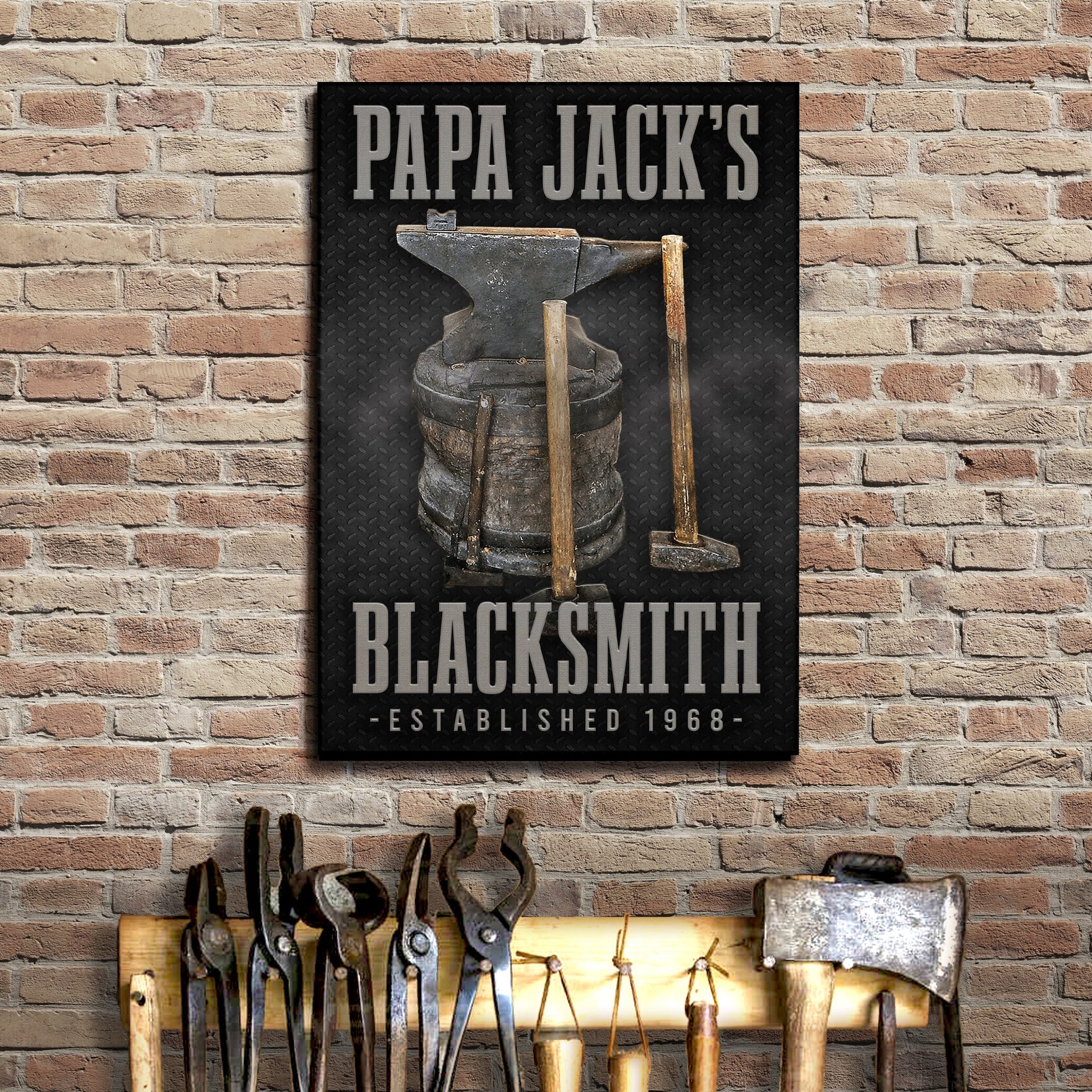 Blacksmith Sign canvas by Tailored Canvases with gray lettering and anvil motif on Tampa Home & Garden Store