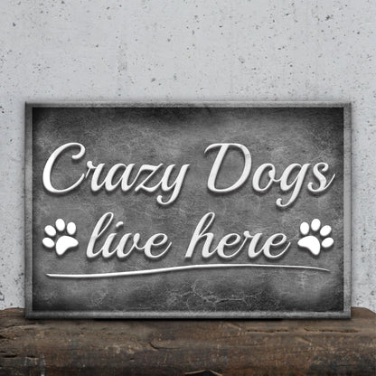 Crazy Dogs Live Here Sign II canvas with white cursive text on a dark plaque and paw prints on Tampa Home & Garden Store