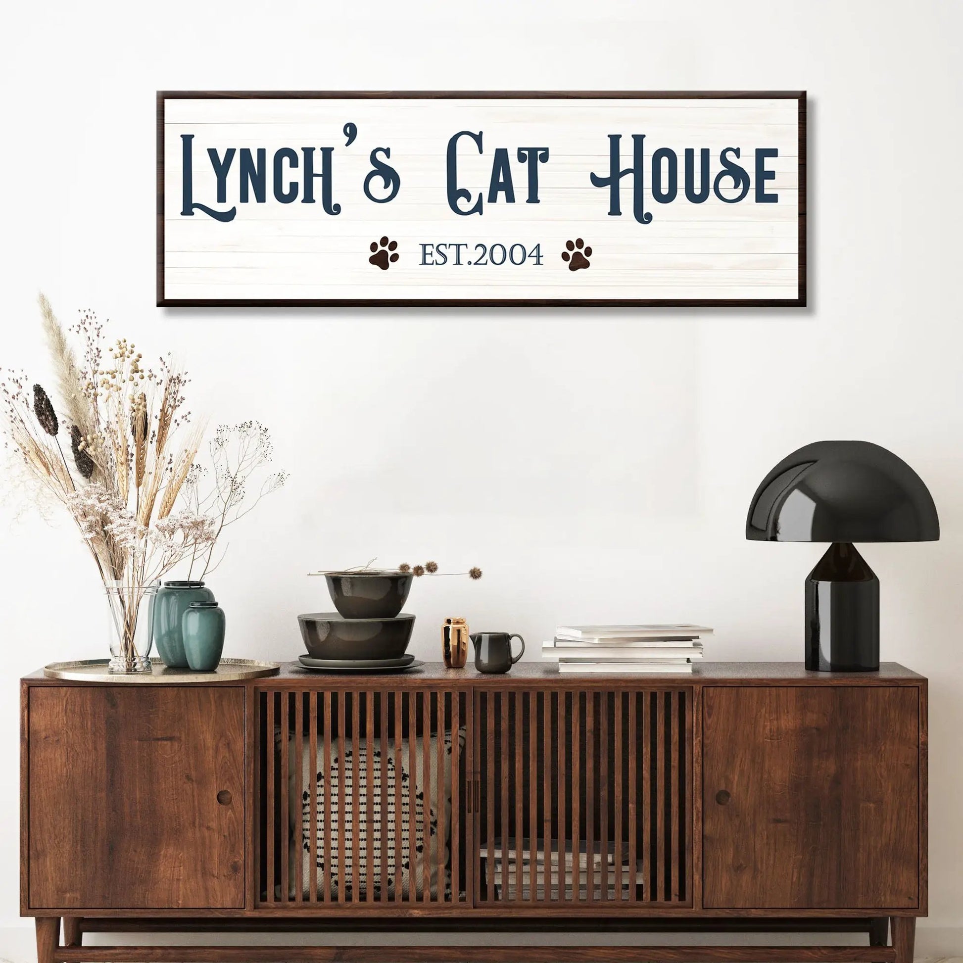 Cat House Sign canvas with whitewashed planks, navy Lynch's Cat House lettering and paw prints on Tampa Home & Garden Store