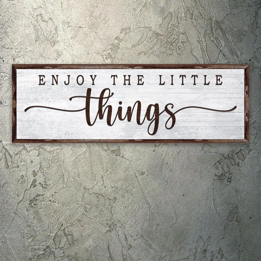 Canvas sign Enjoy the Little Things with white distressed background and dark wood frame on Tampa Home & Garden Store