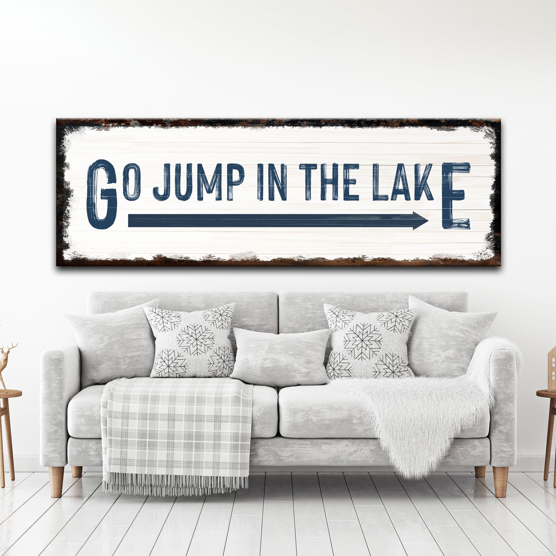 Go Jump In The Lake canvas sign by Tailored Canvases, white wood with navy lettering on Tampa Home & Garden Store