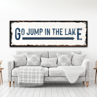 Go Jump In The Lake canvas sign by Tailored Canvases, white wood with navy lettering on Tampa Home & Garden Store