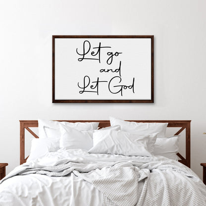 Let go and Let God sign canvas with black script on white canvas in dark wood frame on Tampa Home & Garden Store