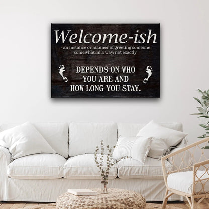 Welcome-ish Funny Home Sign canvas with dark woodgrain background and white lettering on Tampa Home & Garden Store