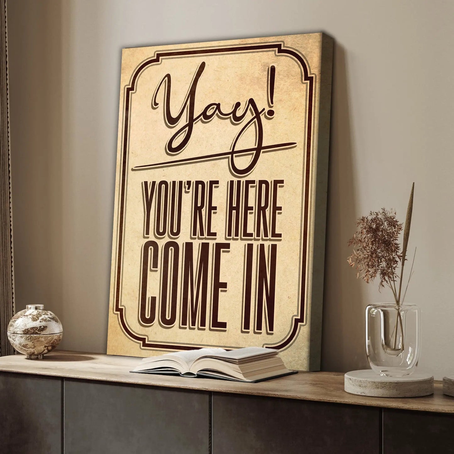 Entryway sign canvas by Tailored Canvases with bold brown script Yay You're Here on Tampa Home & Garden Store