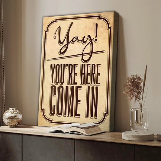 Entryway sign canvas by Tailored Canvases with bold brown script Yay You're Here on Tampa Home & Garden Store
