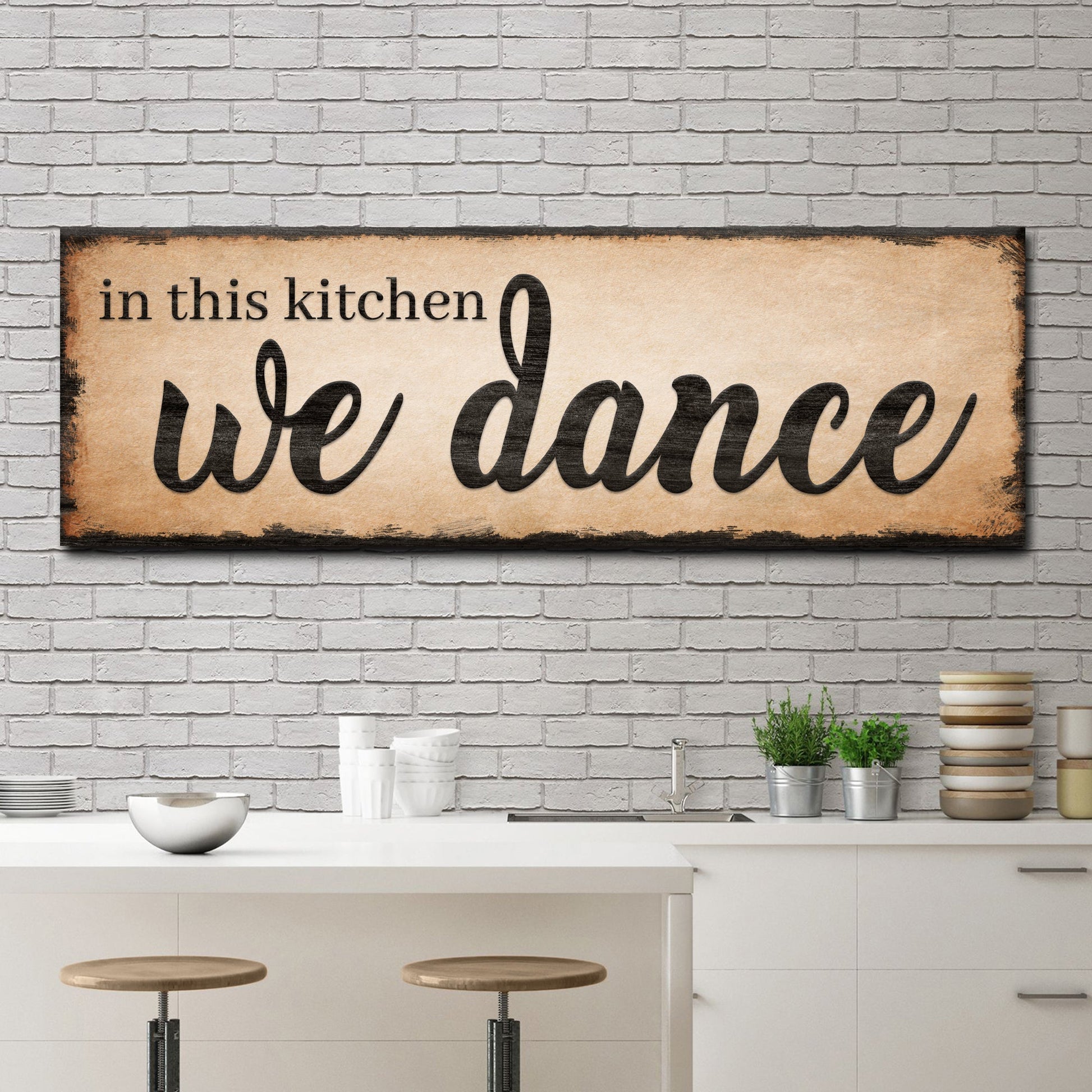 In This Kitchen We Dance Sign III canvas by Tailored Canvases on rustic brick wall on Tampa Home & Garden Store