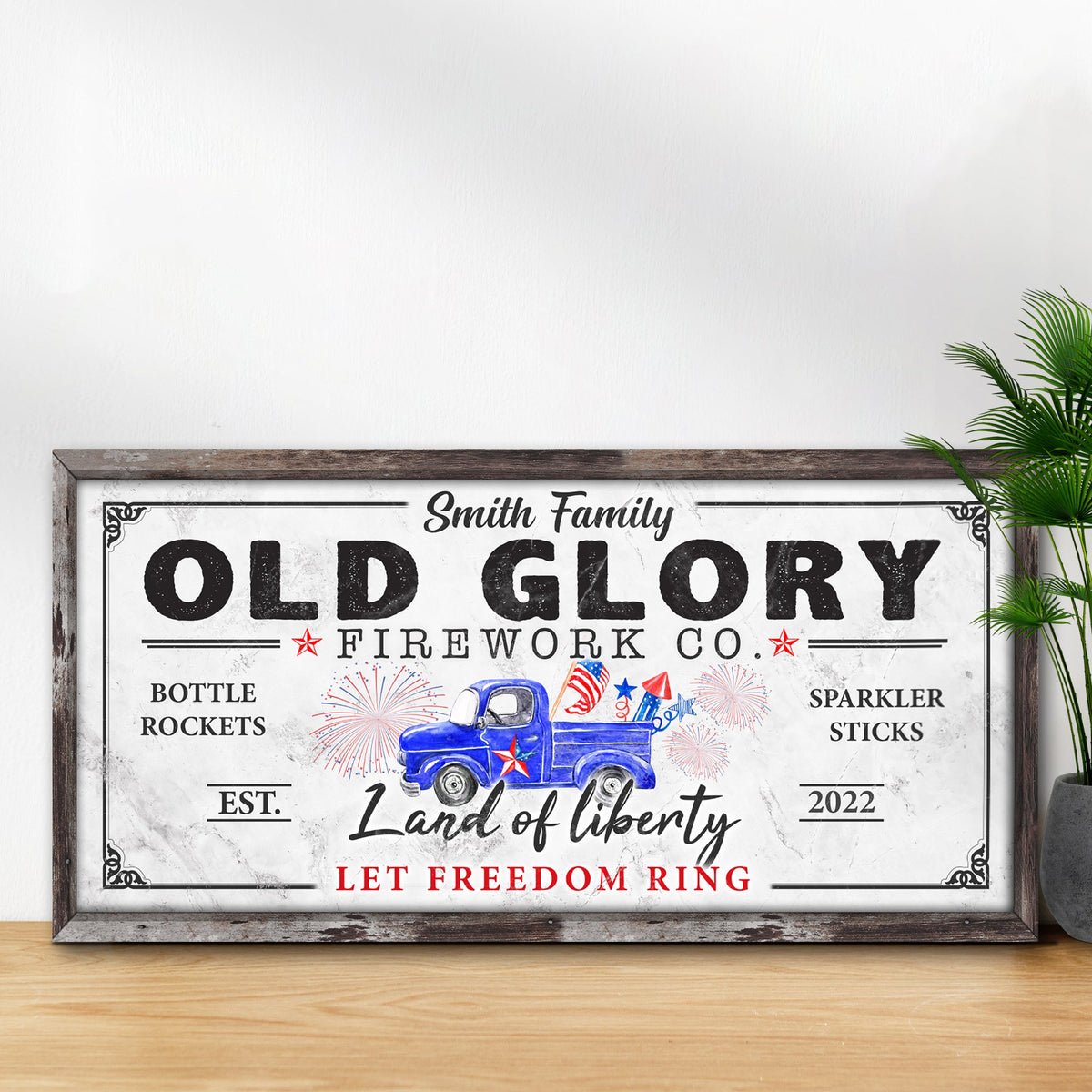 Old Glory Firework Co Let Freedom Ring sign canvas framed in rustic wood with vintage truck on Tampa Home & Garden Store