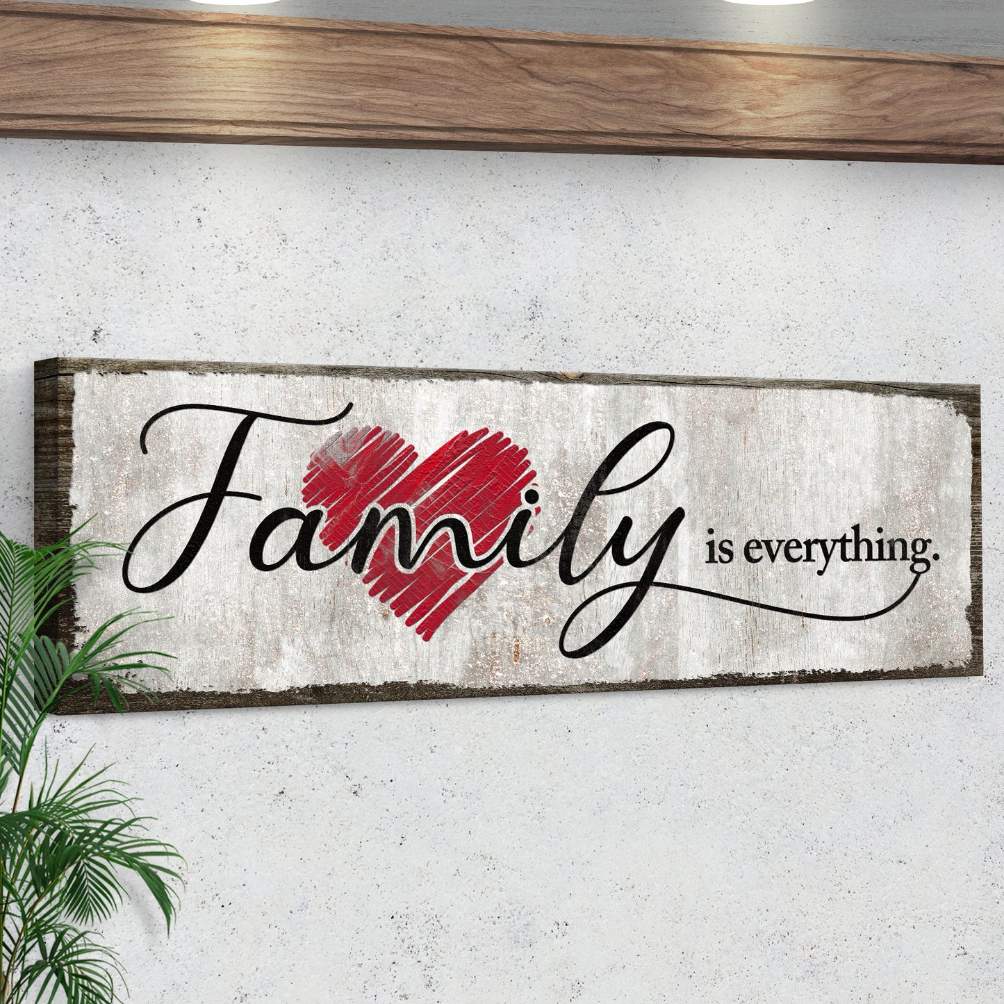 Family Is Everything Sign III canvas sign with black script and red heart on rustic wood frame on Tampa Home & Garden Store