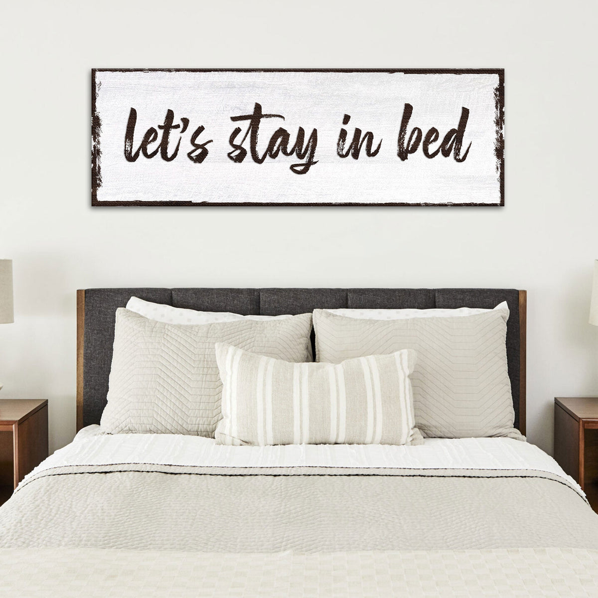 Let's Stay In Bed Sign canvas by Tailored Canvases with white backdrop and brown script on Tampa Home & Garden Store