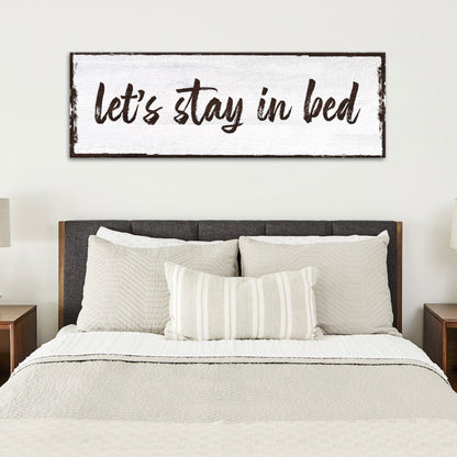 Let's Stay In Bed Sign canvas by Tailored Canvases with white backdrop and brown script on Tampa Home & Garden Store