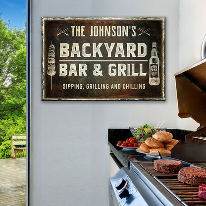 Backyard Bar And Grill Sign canvas by Tailored Canvases with rustic frame and white lettering on Tampa Home & Garden Store