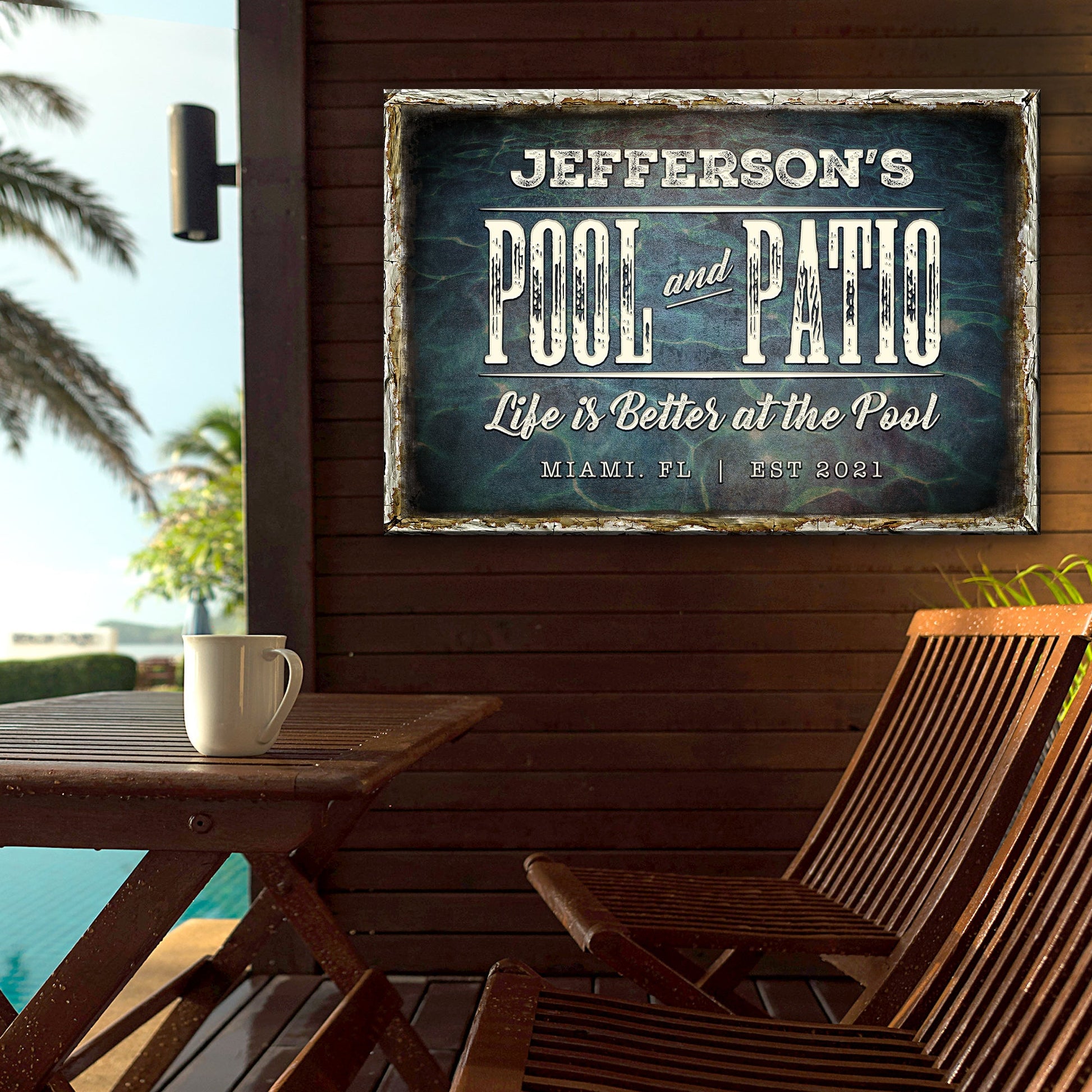 Pool and Patio Sign canvas by Tailored Canvases, teal backdrop, cream lettering on Tampa Home & Garden Store