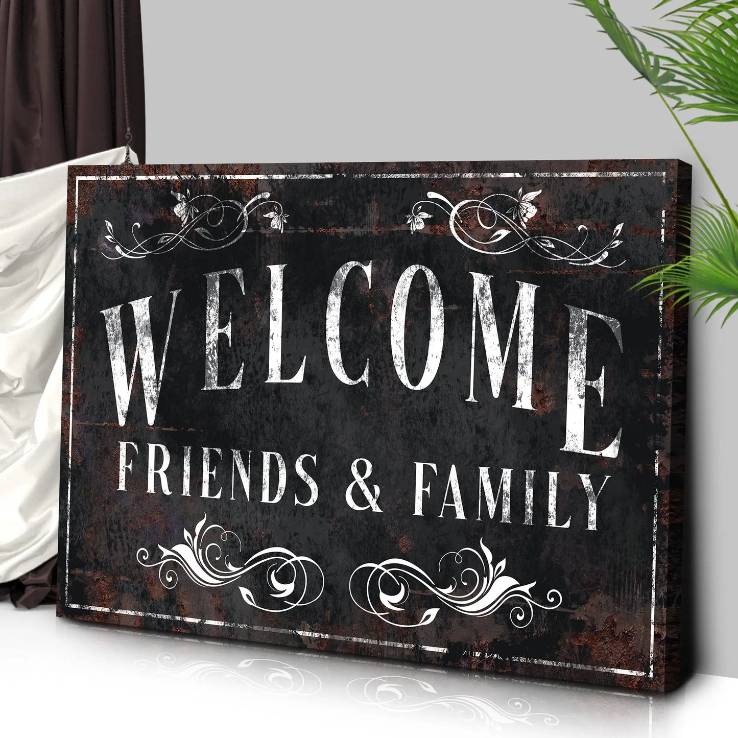 Welcome Friends & Family Sign III canvas with distressed black panel and white scrolls on Tampa Home & Garden Store