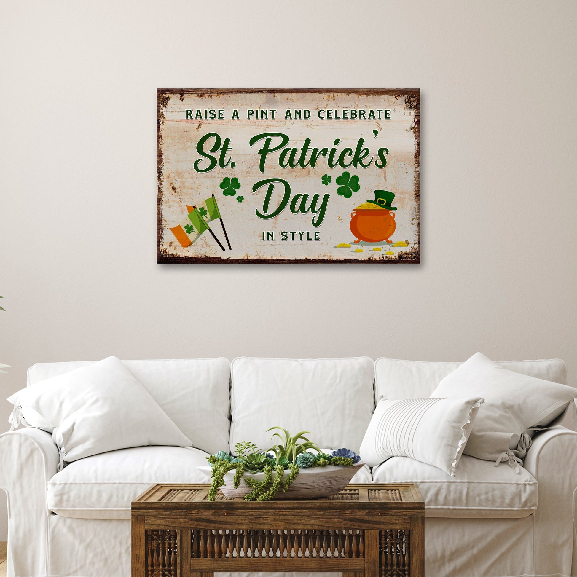 Canvas sign by Tailored Canvases, distressed white background, green St Patrick's Day lettering on Tampa Home & Garden Store