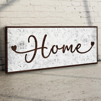 Home Sign II canvas crafting sign with rustic wood frame on whitewashed textured brick backdrop on Tampa Home & Garden Store