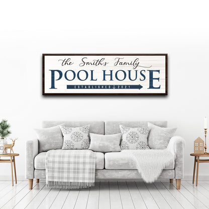 Family Pool House Sign canvas wall art with navy text on white wood panel framed in dark brown on Tampa Home & Garden Store