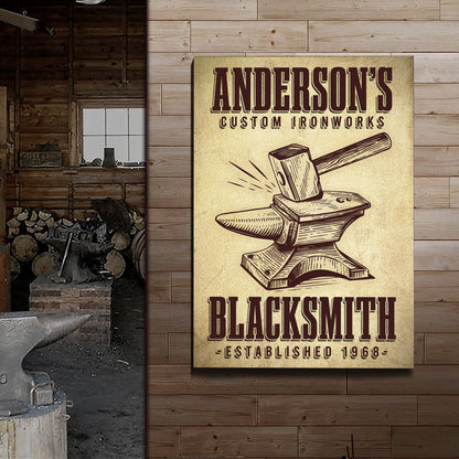 Canvas sign Anderson's Custom Ironworks with hammer and anvil on rustic wood on Tampa Home & Garden Store