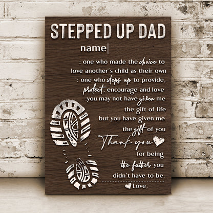 Canvas sign Tailored Canvases with wood grain background featuring STEPPED UP DAD and customizable name on Tampa Home & Garden Store