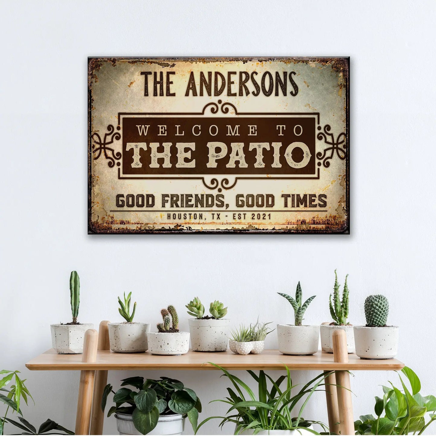 Tailored Canvases crafting canvas sign with distressed rustic look and welcome to patio text on Tampa Home & Garden Store