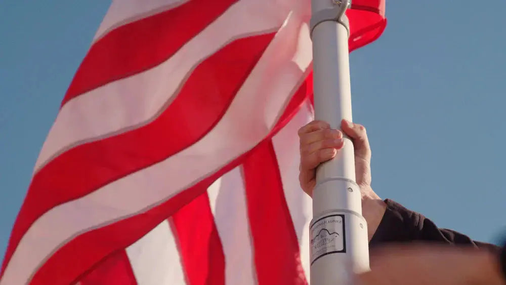 Titan Telescoping Flagpole by Flagman of America with American flag on Tampa Home & Garden Store