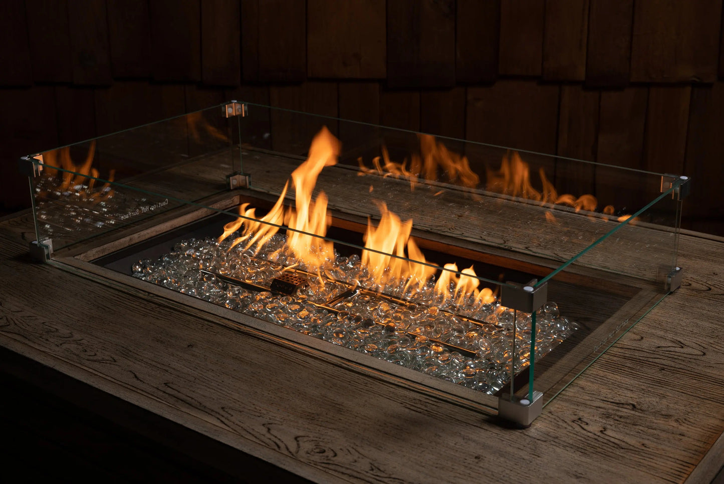Tempered glass wind guard for rectangle LPG fire pit by Fire Sense with clear panels on Tampa Home & Garden Store