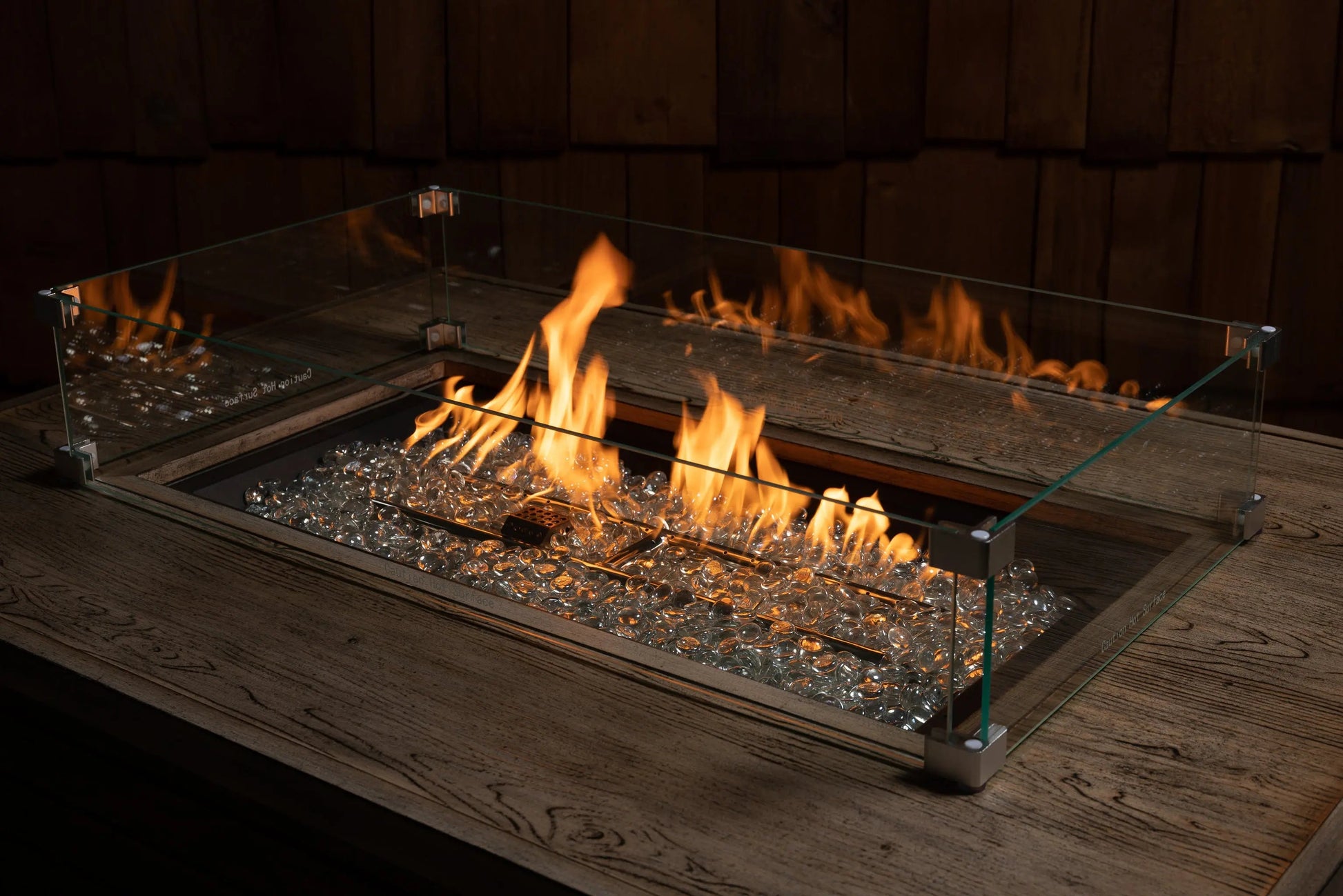 Tempered glass wind guard for rectangle LPG fire pit by Fire Sense with clear panels on Tampa Home & Garden Store