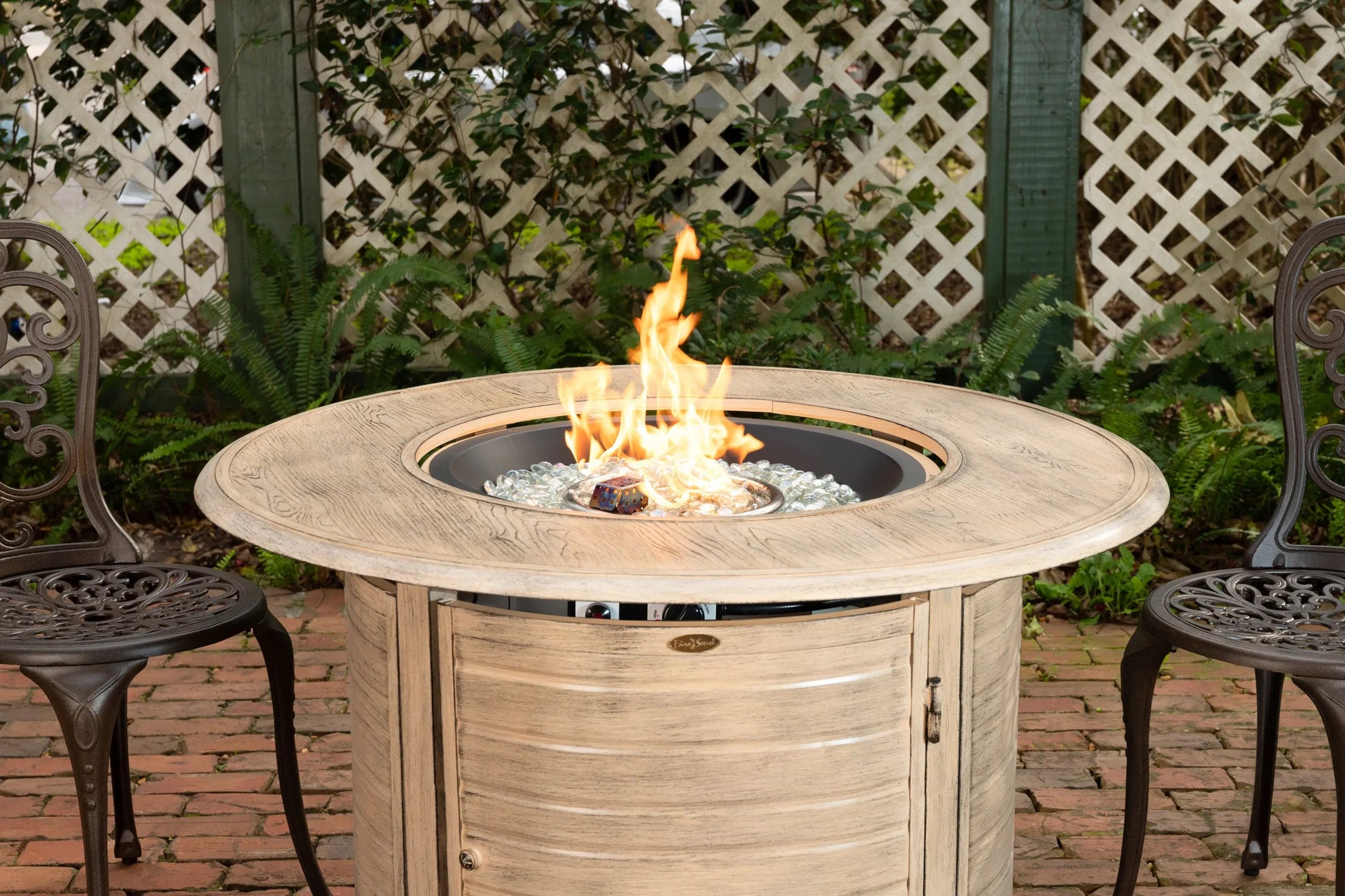 Thatcher Driftwood aluminum LPG fire pit in driftwood table with glass beads and flame on Tampa Home & Garden Store