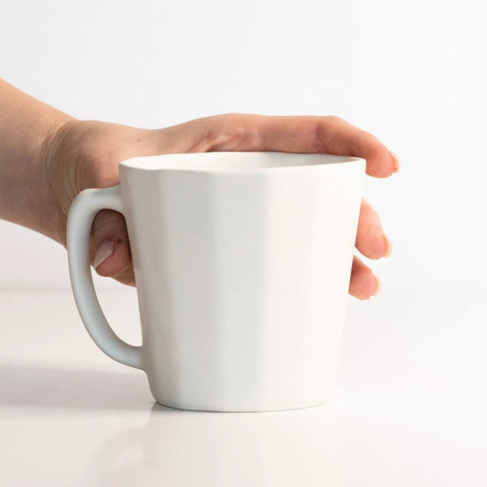 Monday Mug handmade porcelain coffee cup in white ceramic held in a hand, Ember Collective on Tampa Home & Garden Store
