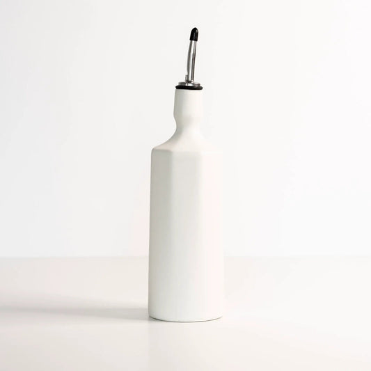 Elixir Porcelain Olive Oil Dispenser Ember Collective with white bottle and metal pump head on Tampa Home & Garden Store