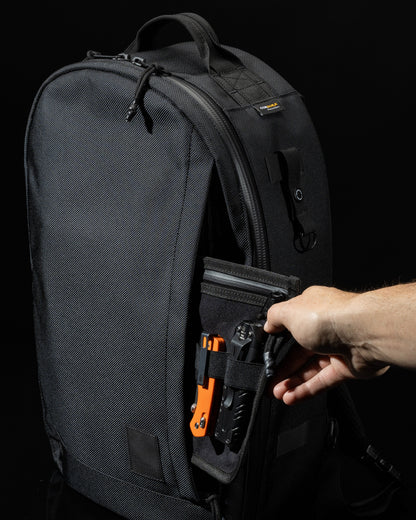 Conceal Pack 21L backpack black Cordura fabric by The Brown Buffalo with side tool pocket on Tampa Home & Garden Store