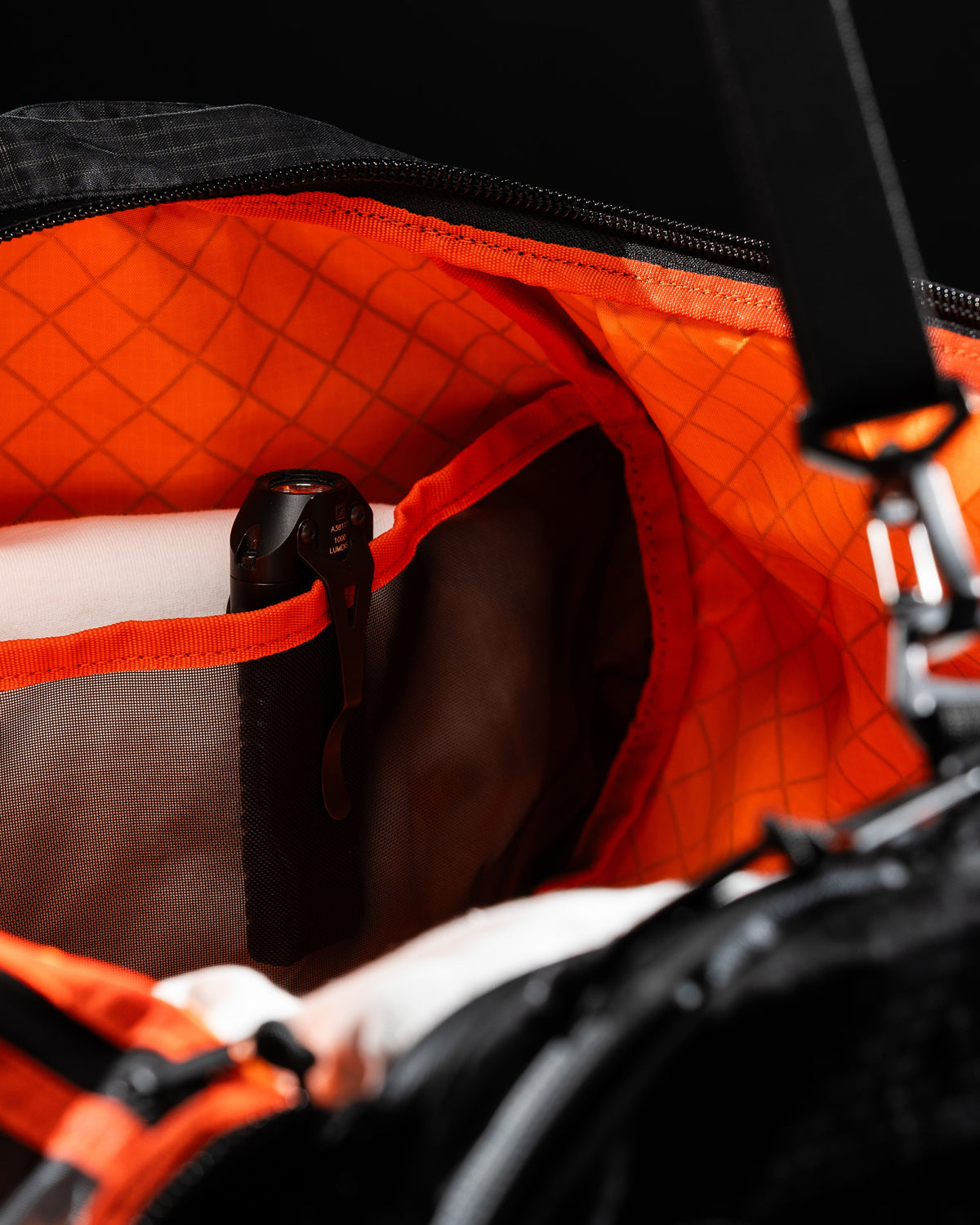 Duffalo duffel bag with orange interior lining and black exterior by The Brown Buffalo on Tampa Home & Garden Store
