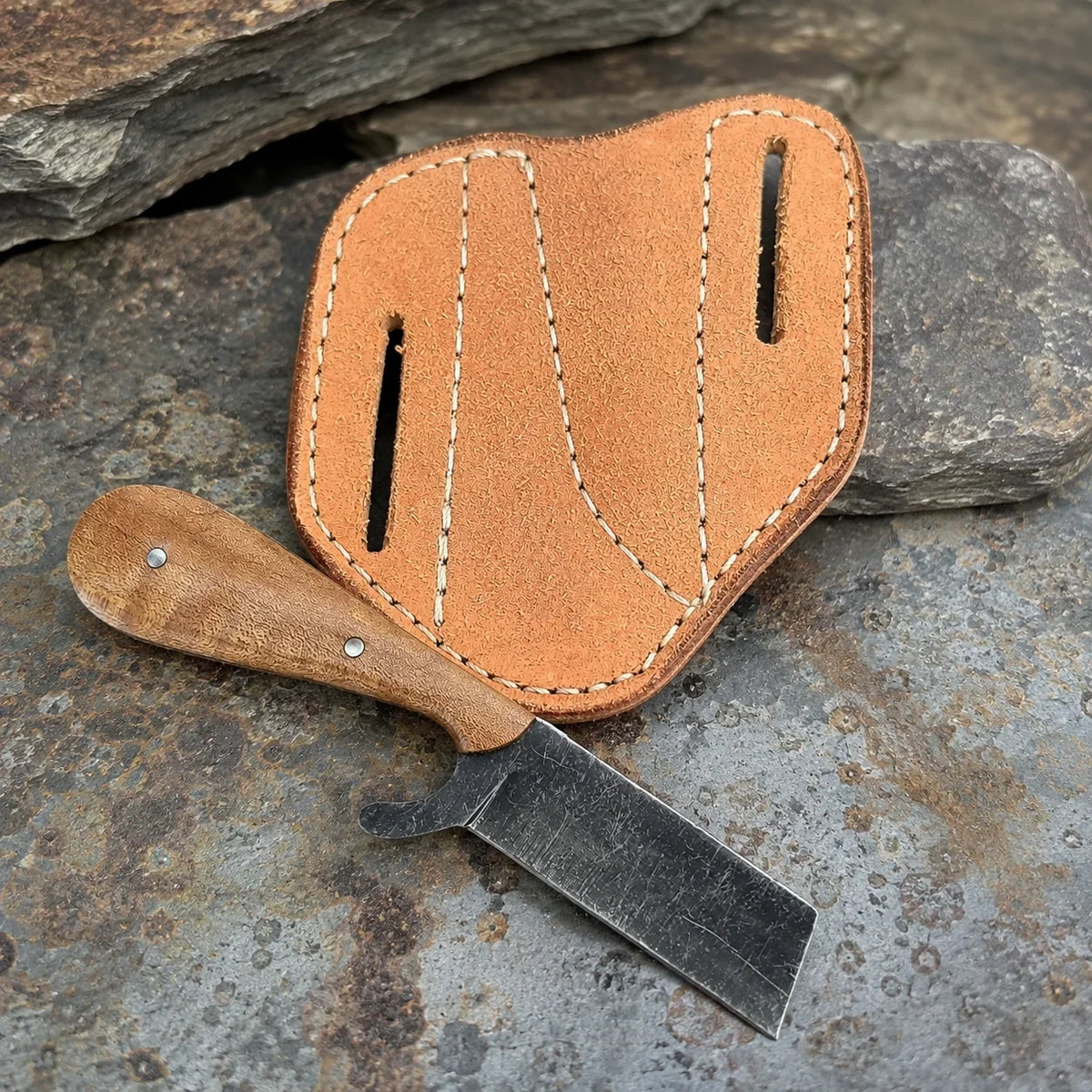 The Plainsman fixed blade knife with D2 steel blade walnut handle leather sheath on Tampa Home & Garden Store